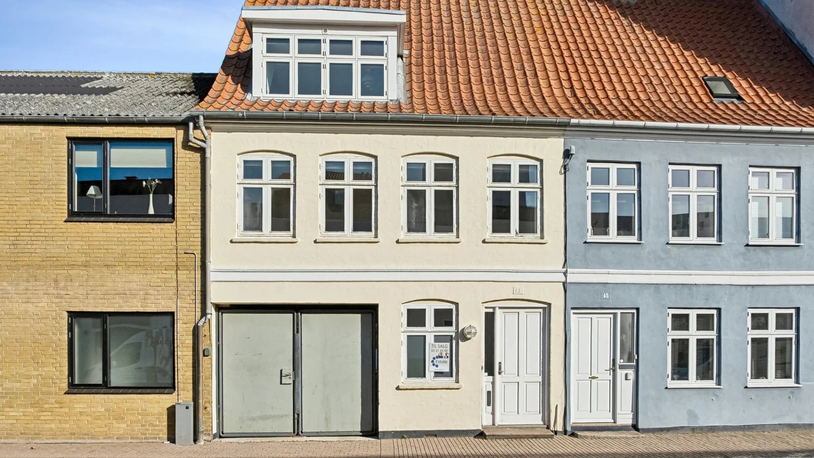 Ugens bolig: Lys og charmerende bybolig med gårdmiljø i Nyborg