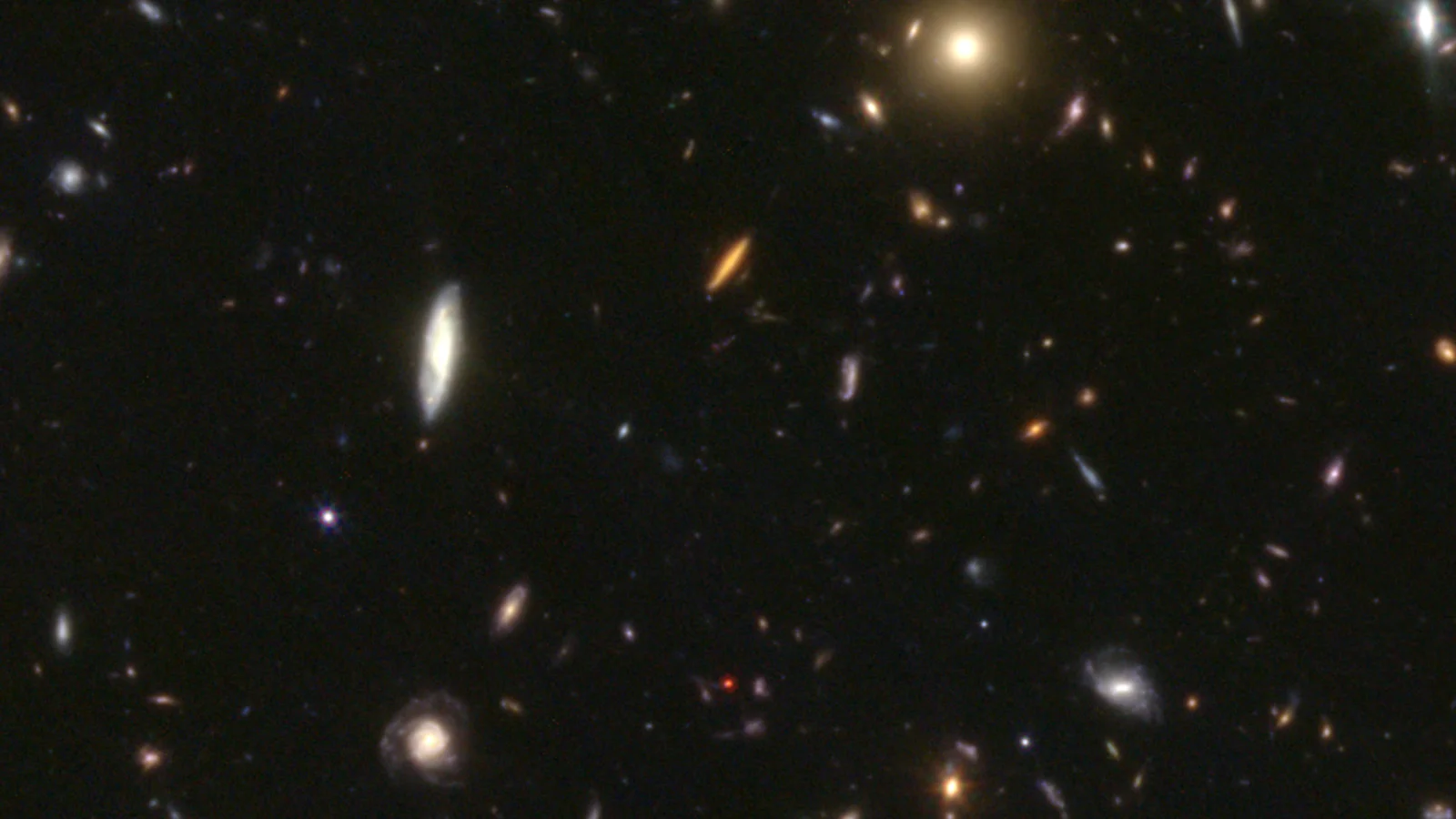 KU-forskere indtager forsiden af Nature: Løser mysteriet om universets røde prikker
